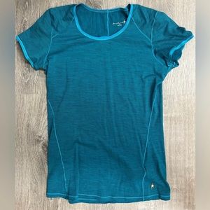 Re-list with damage, two holes. Smartwool Medium Shirt